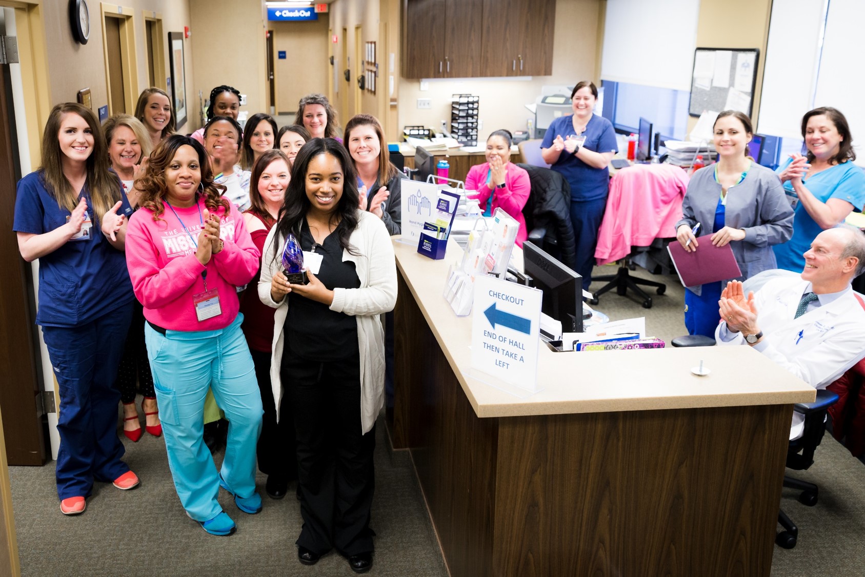 Monthly Extra Mile Award Presentation at Lakeland Medical Building